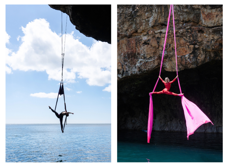 Aerial hammock artist performing trick inside a natural sea cave over turquoise water in Lagos Portugal